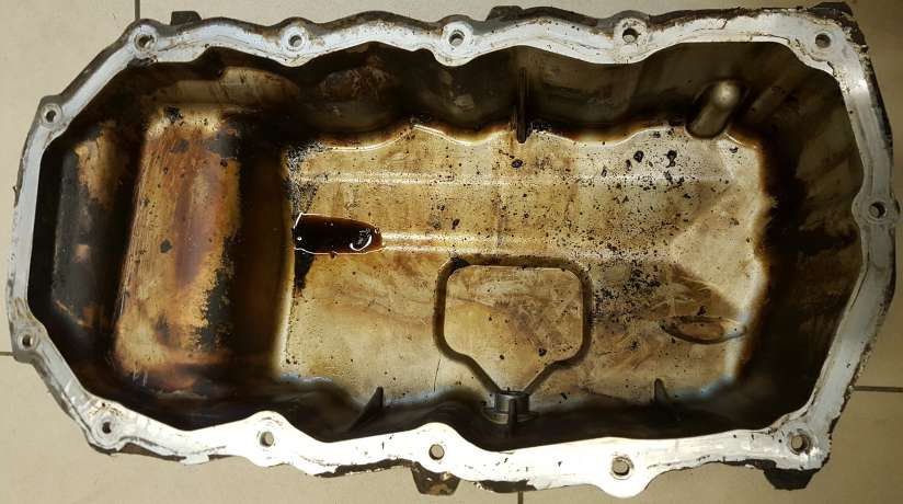 Поддон двигателя Б/У Chrysler Voyager 2.4л EDZ Dodge Caravan GAZ Volga Siber Sebring Dodge Stratus 04694525AC